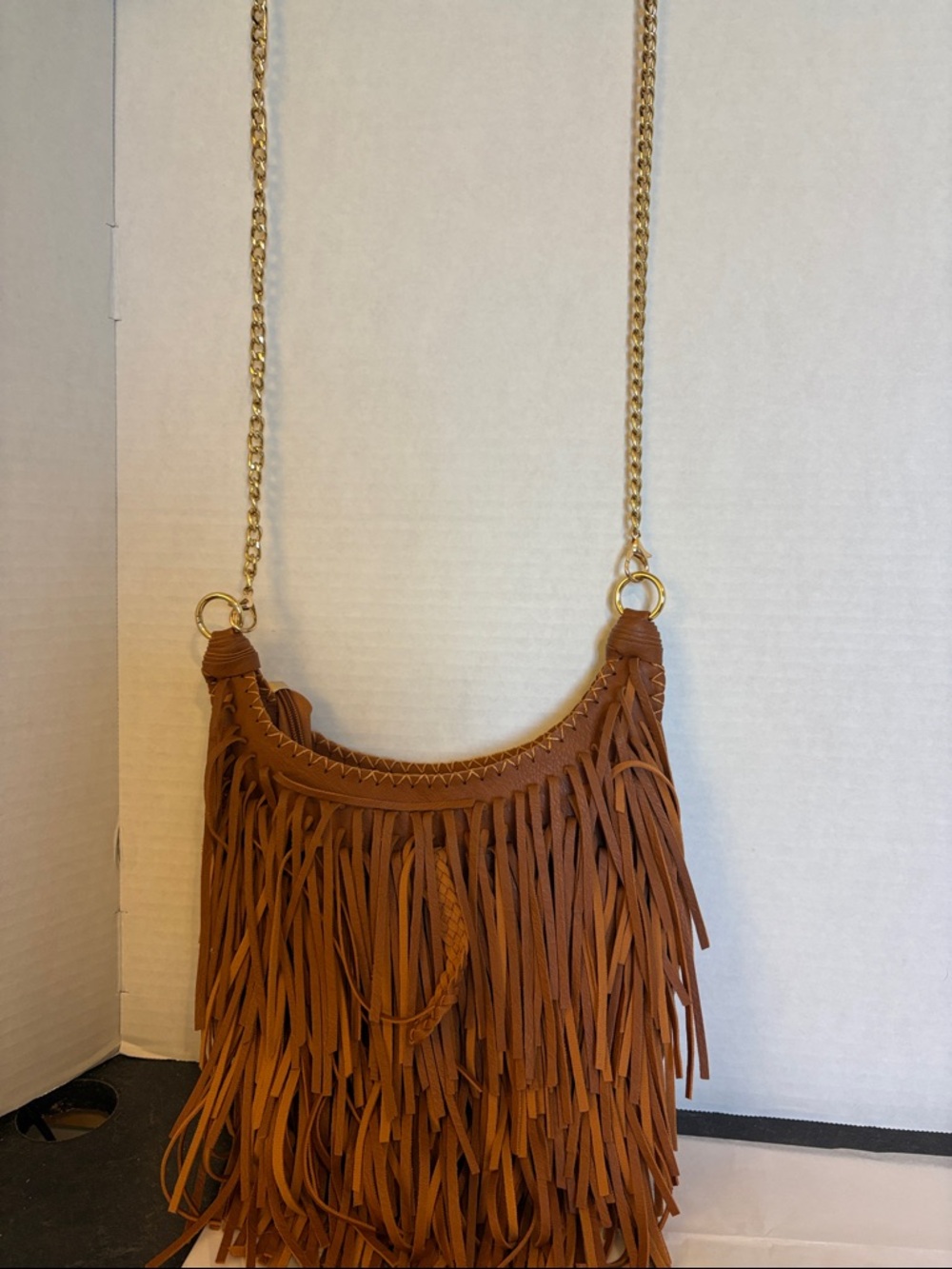 Fringed Brown Crossbody Bag with Gold Chain Strap